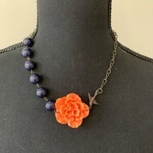 Plunder unique necklace. Has blue beads orange flower metal bird. Antique chain